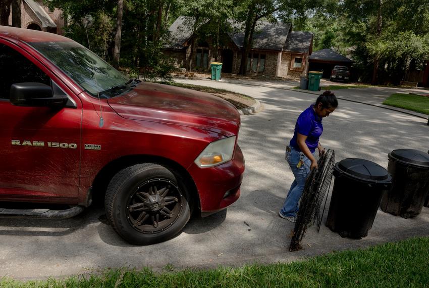 Lisbet Avila visits different client yards to review the work still to be done by her landscaping team, Friday, May 23, 2025, in Houston. 

(Lexi Parra for The Texas Tribune)